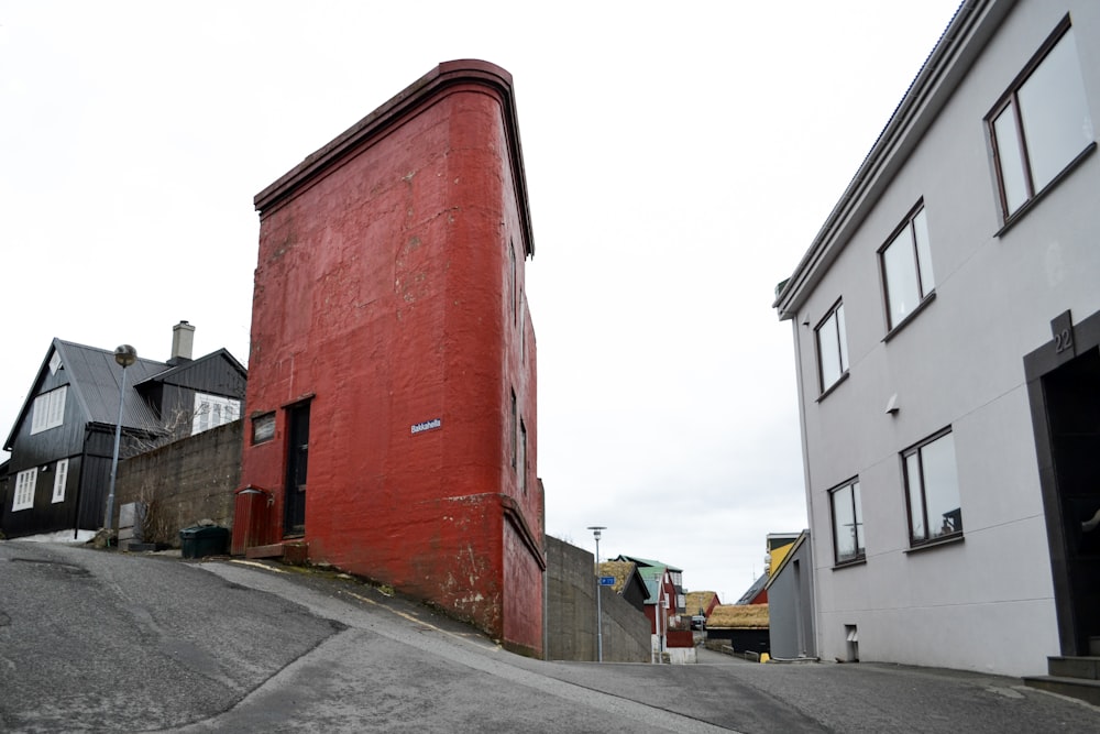 red and white concrete building during daytime