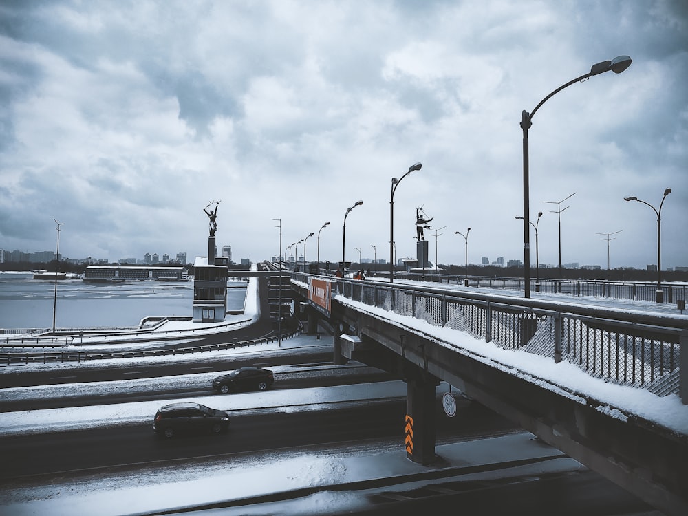 bridge covered with snow viewing sea