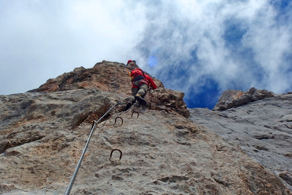 man mountain climbing