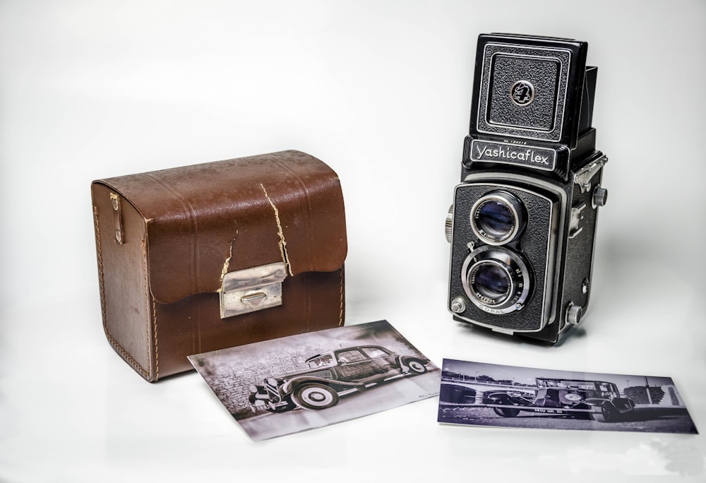 vintage camera with brown leather case