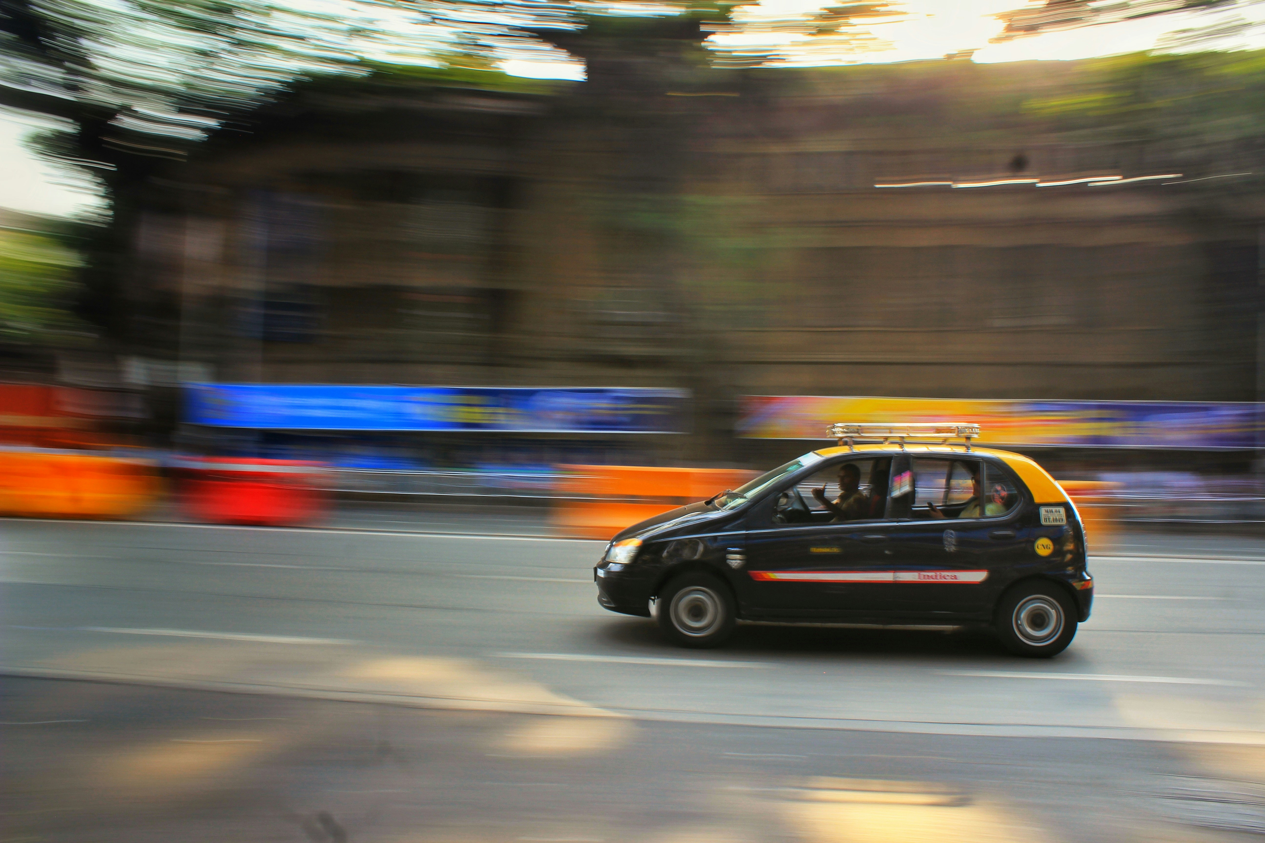 Black 5-door hatchback on road