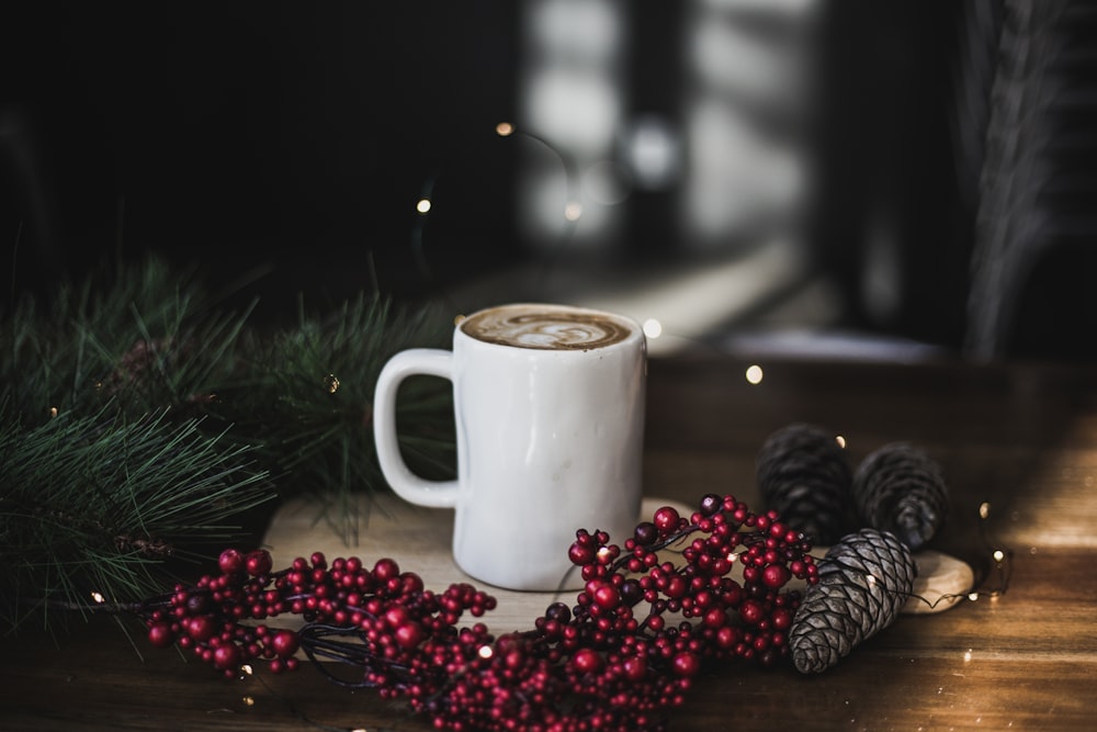 white ceramic mug filled with brown and white liquid