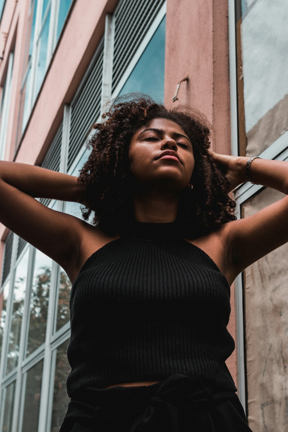 woman in black tops