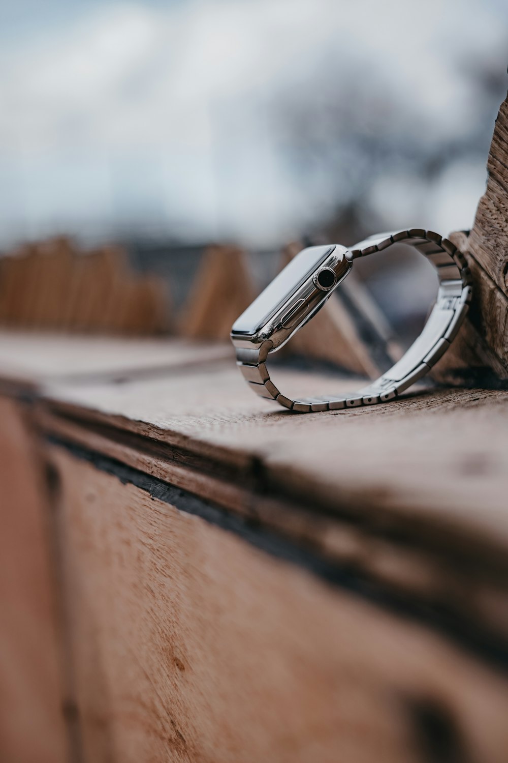 silver aluminum case Apple Watch on floor