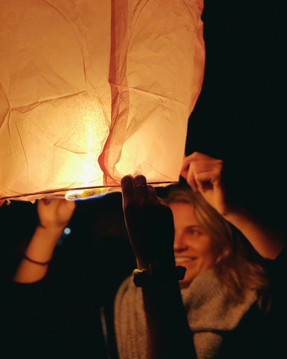 woman holding lantern