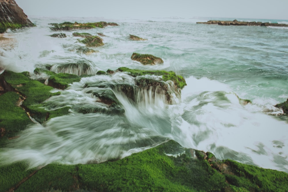 time lapse photo of sea water waving on high ground