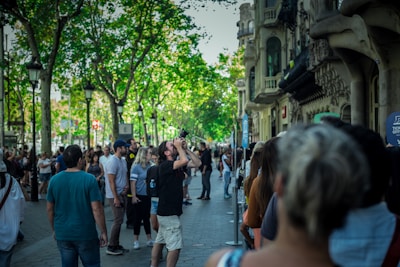 A scenic guided tour group exploring a vibrant city street filled with culture.