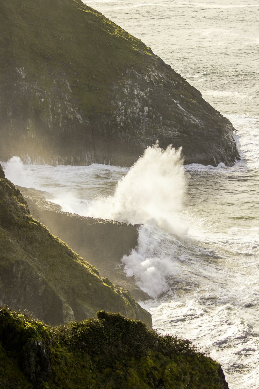 sea waves splashing on rocks