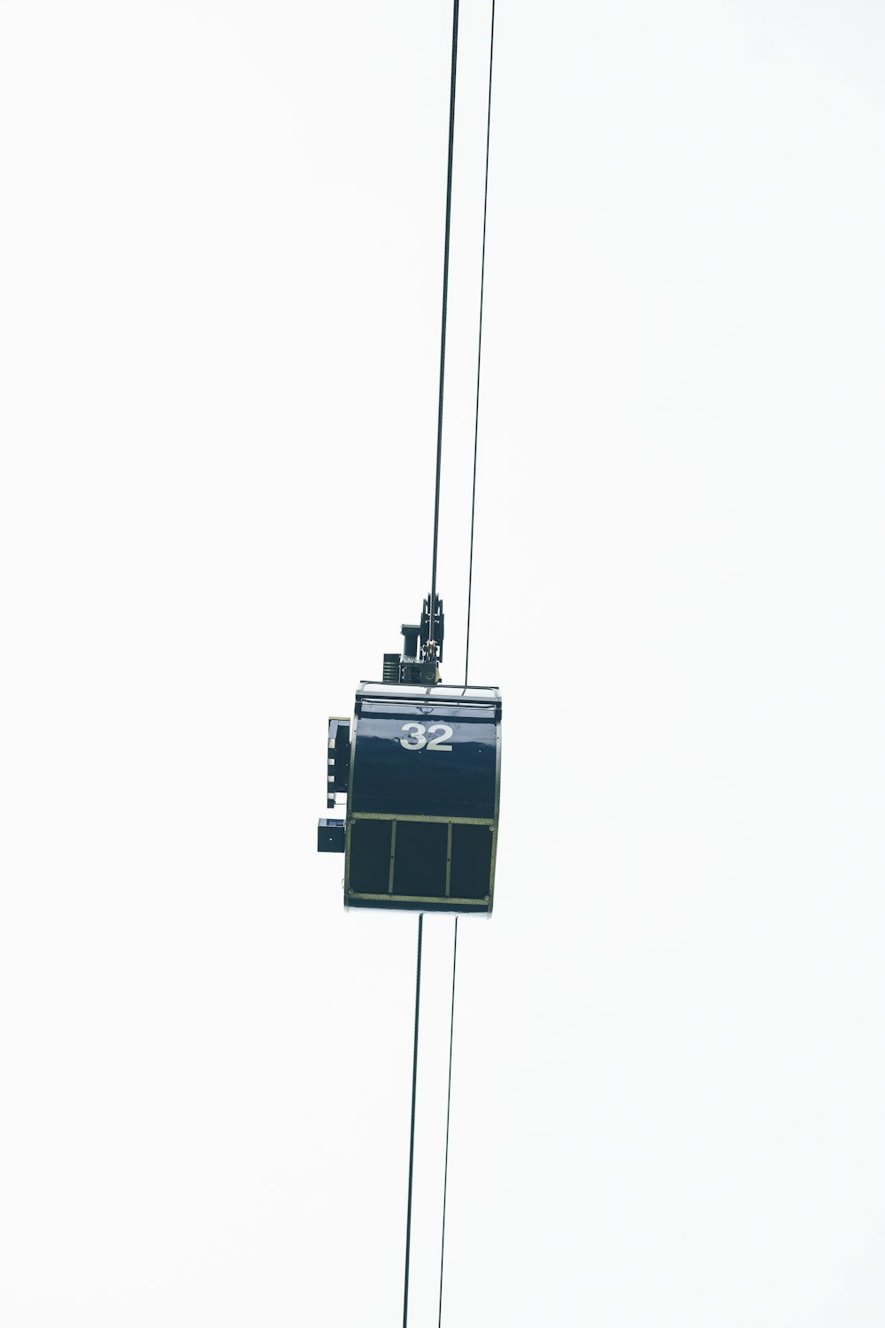 cable car on line during daytime