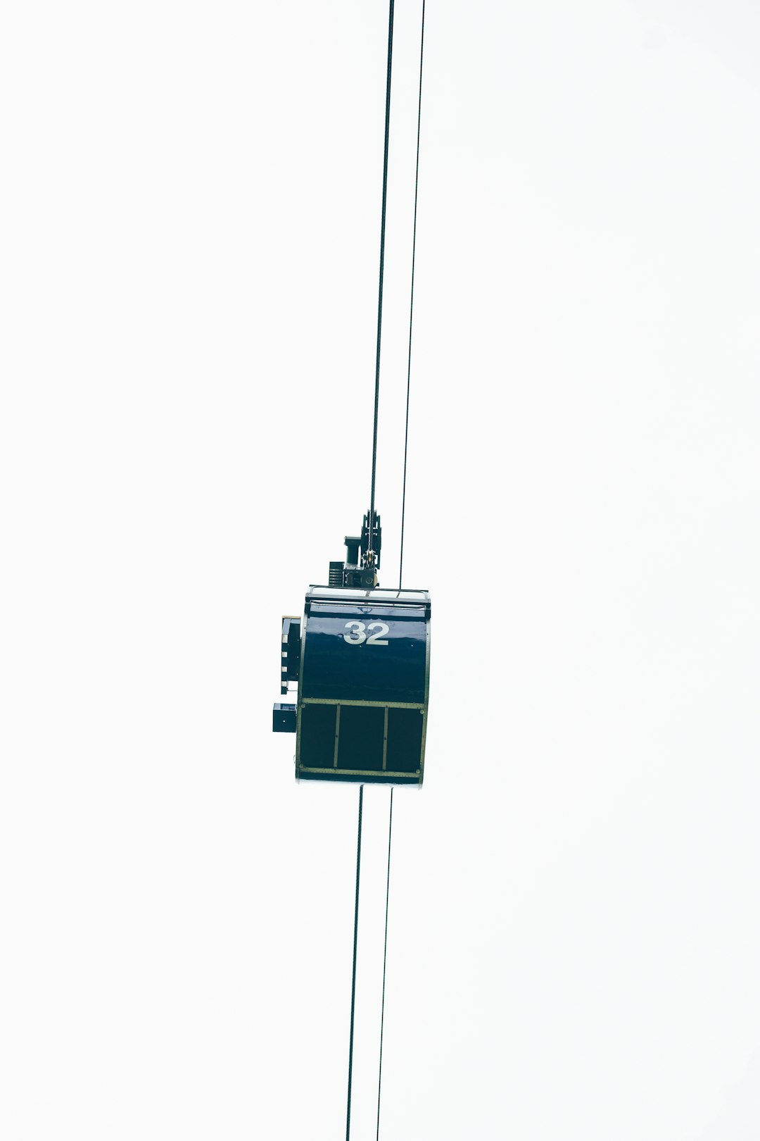 cable car on line during daytime