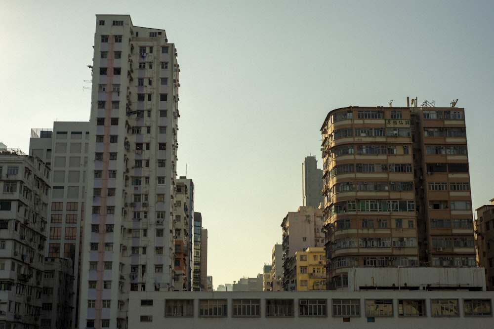 low-angle photography of high-rise buildings during daytime