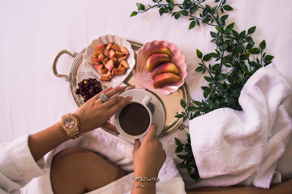 woman holding coffee