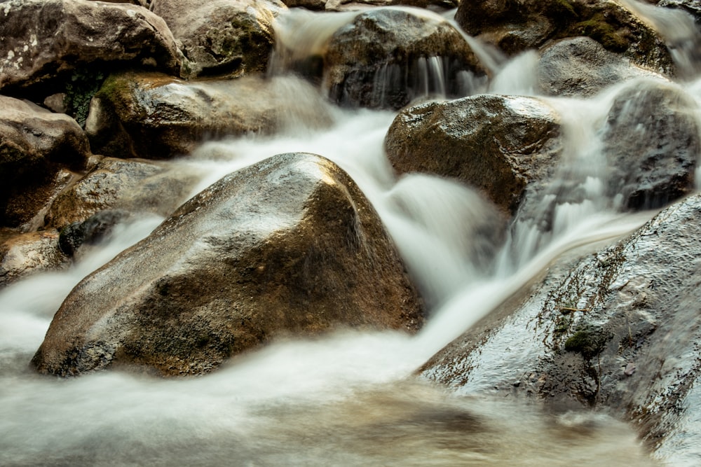 time lapse photography of waterfalls