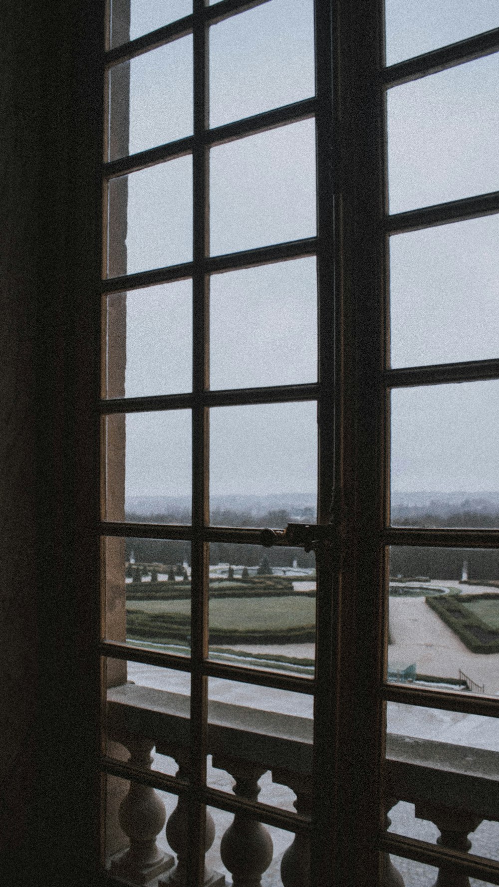 black wooden framed glass window