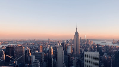 empire state building, new york during day city google meet background