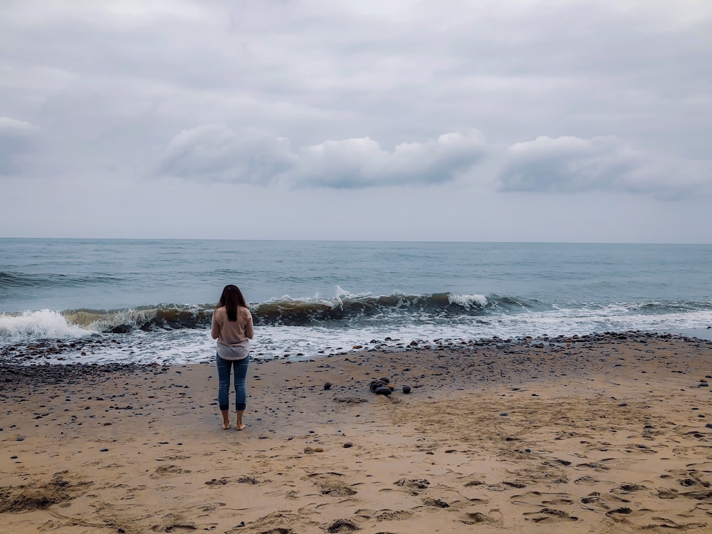 woman standing on shore