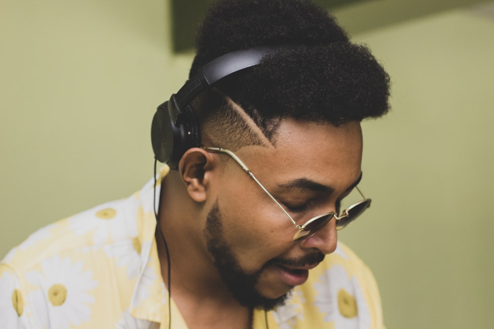 man wearing sunglasses and headphones