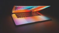 Open laptop displaying vibrant digital educational content for kids.
