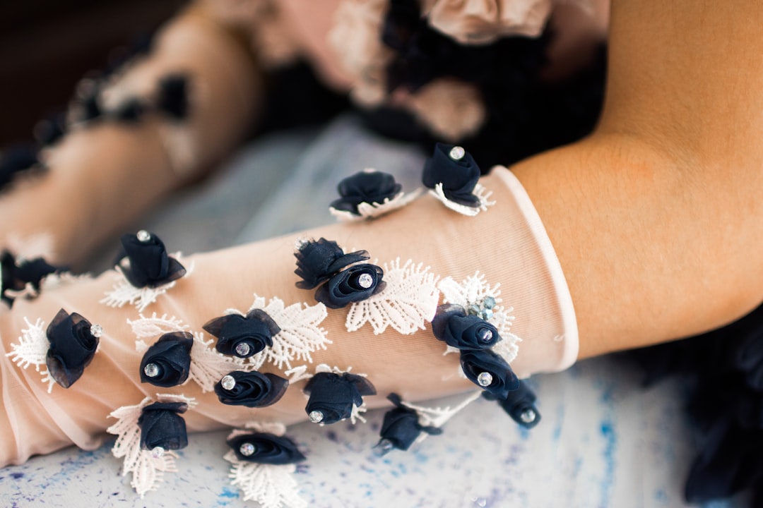 white and black floral gloves