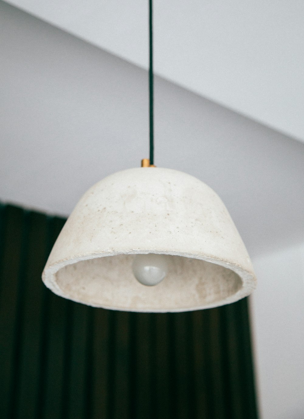 turned off white pendant lamp