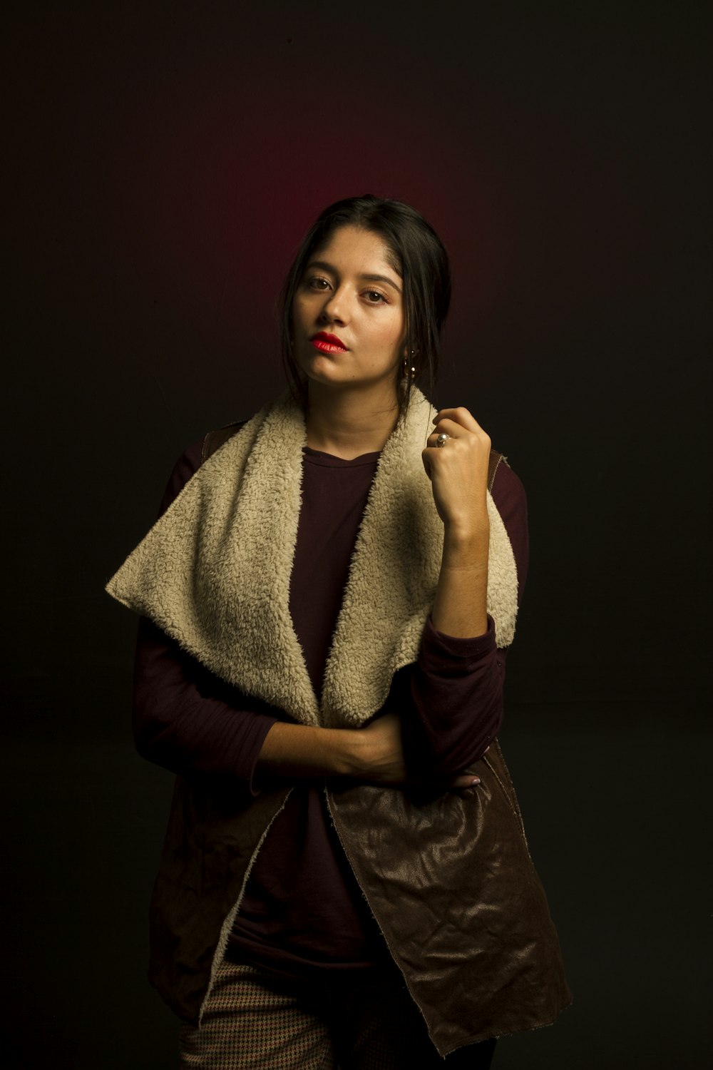 woman wearing white and brown leather jacket