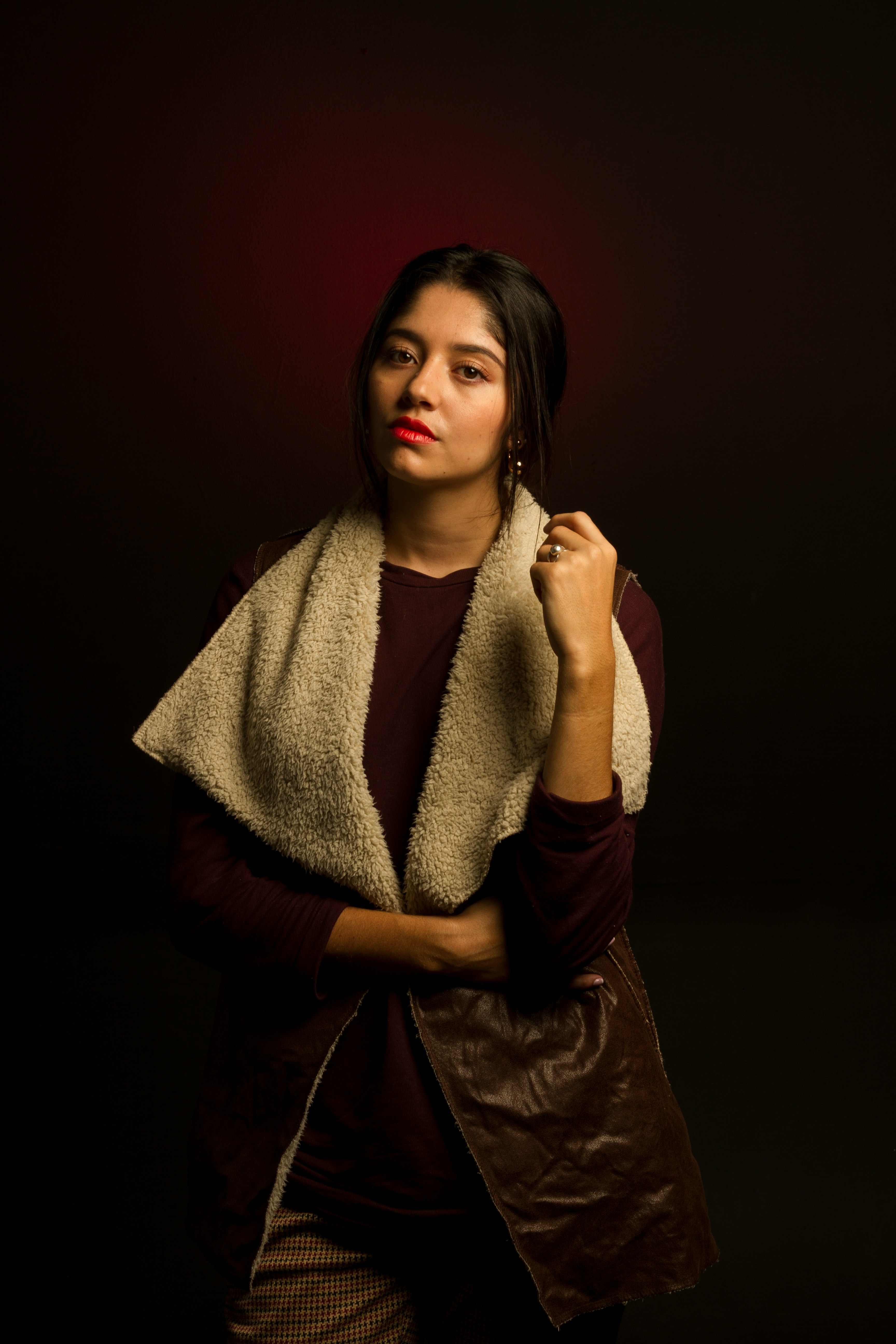 woman wearing white and brown leather jacket