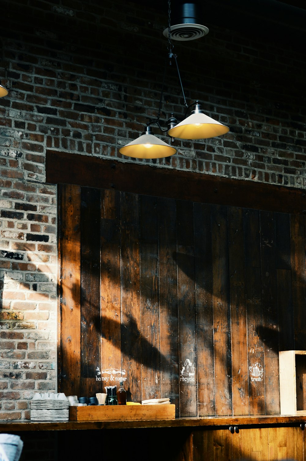 pair of yellow ceiling lamps