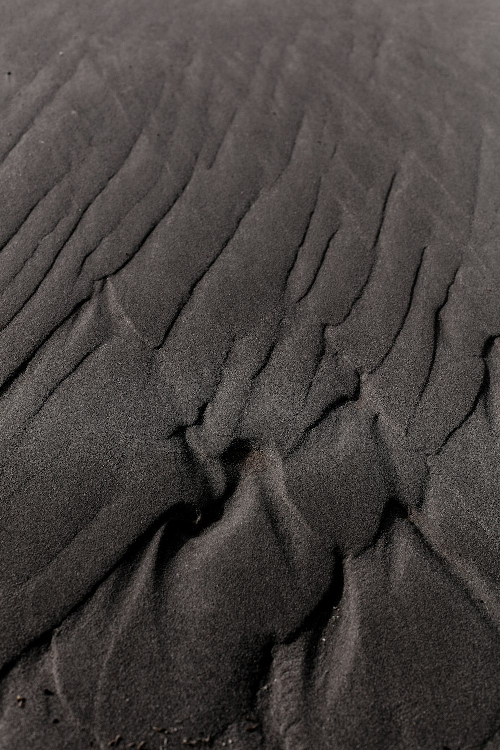 gray sand on shore