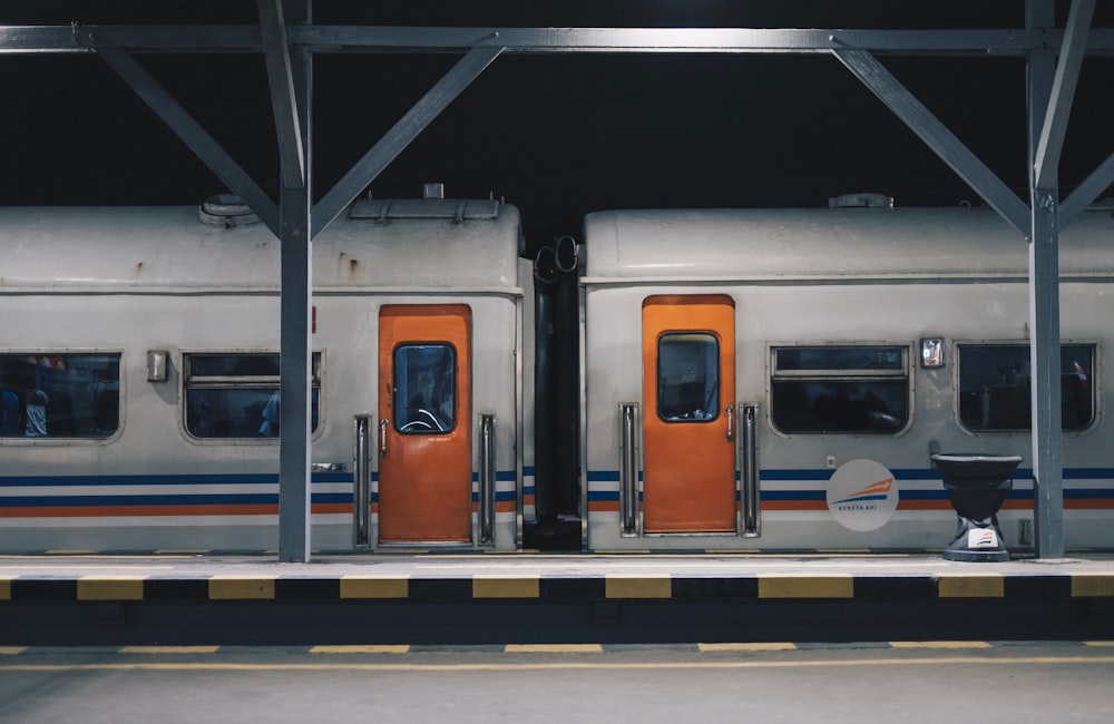 two gray train cars