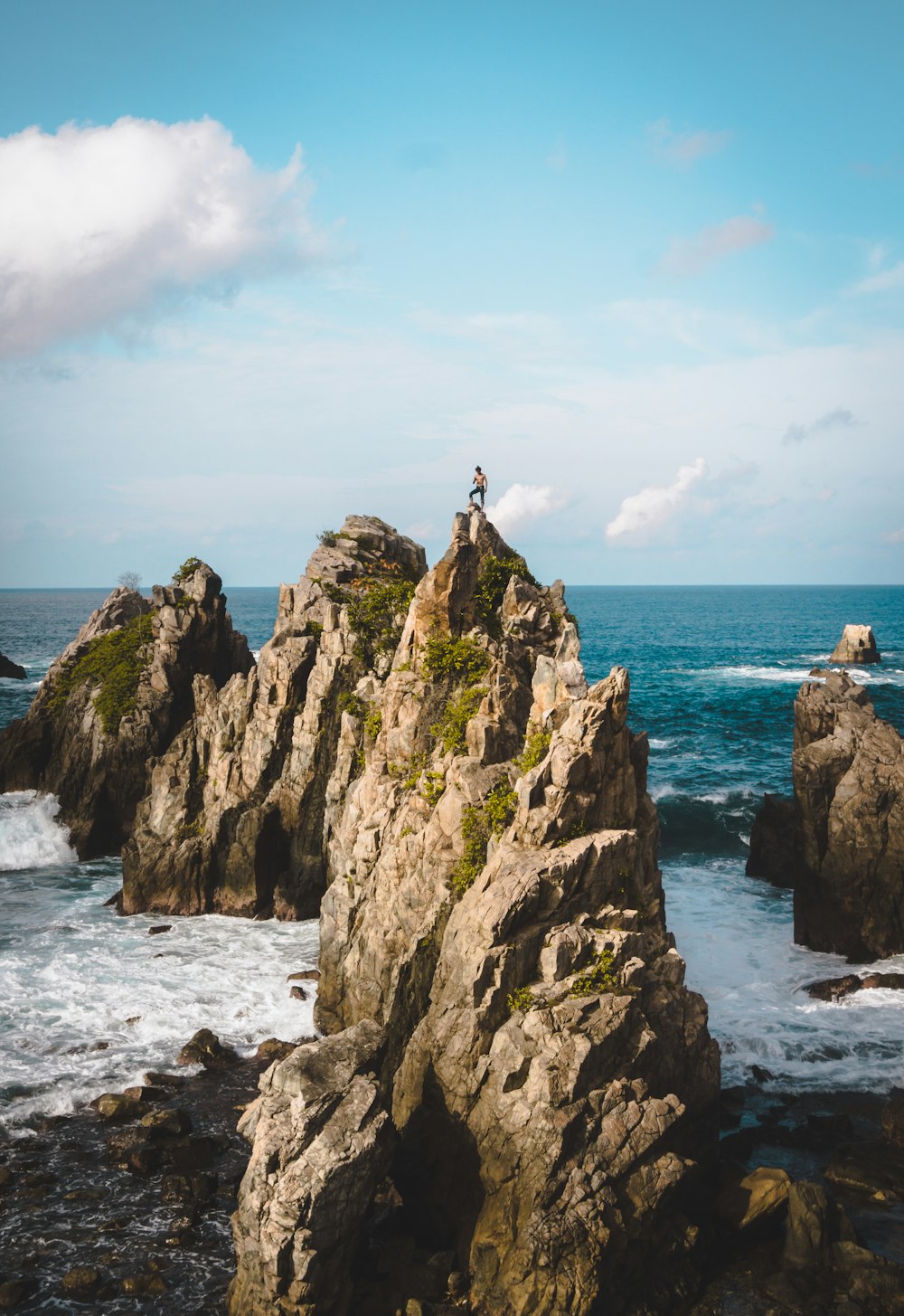 gray rock formations on shore