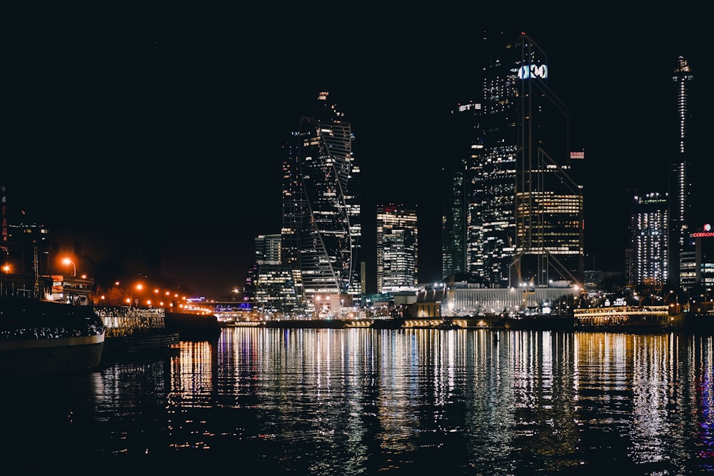 high rise buildings near body of water