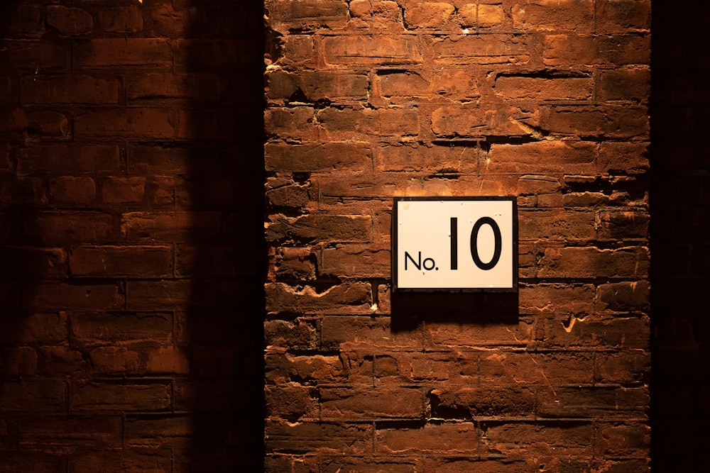 no. 10 sign on brick wall