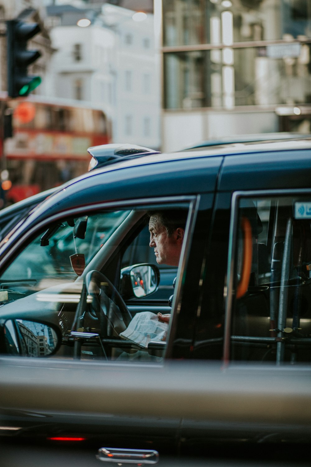 man driving car