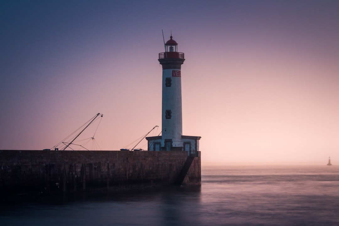 white lighthouse during golden hour