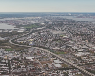 Satellite view of an urban area highlighting community safety zones with digital mapping overlays.