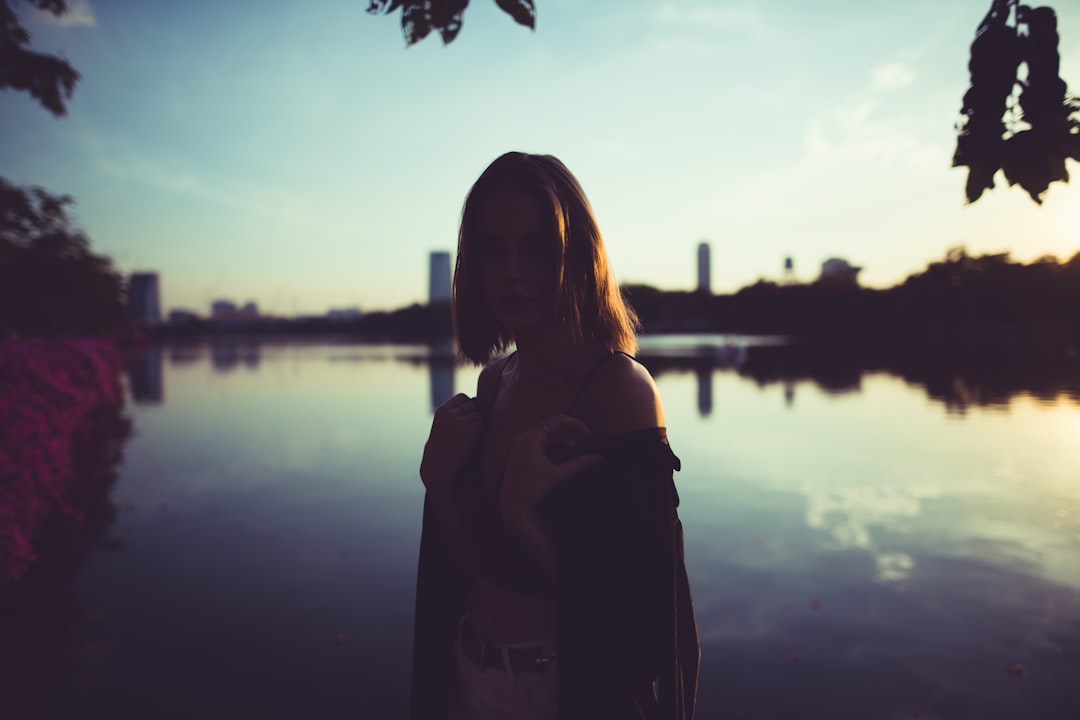 woman near body of water