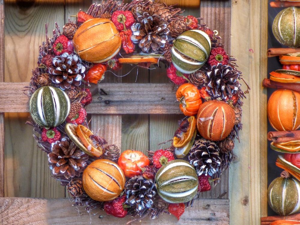 closeup photo of brown, green, and maroon floral door wreath