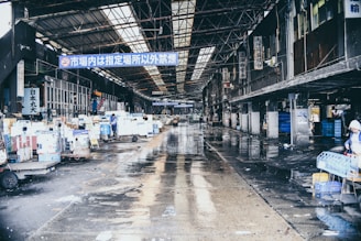boxes and carts inside open building
