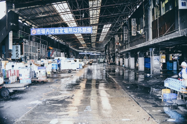 boxes and carts inside open building