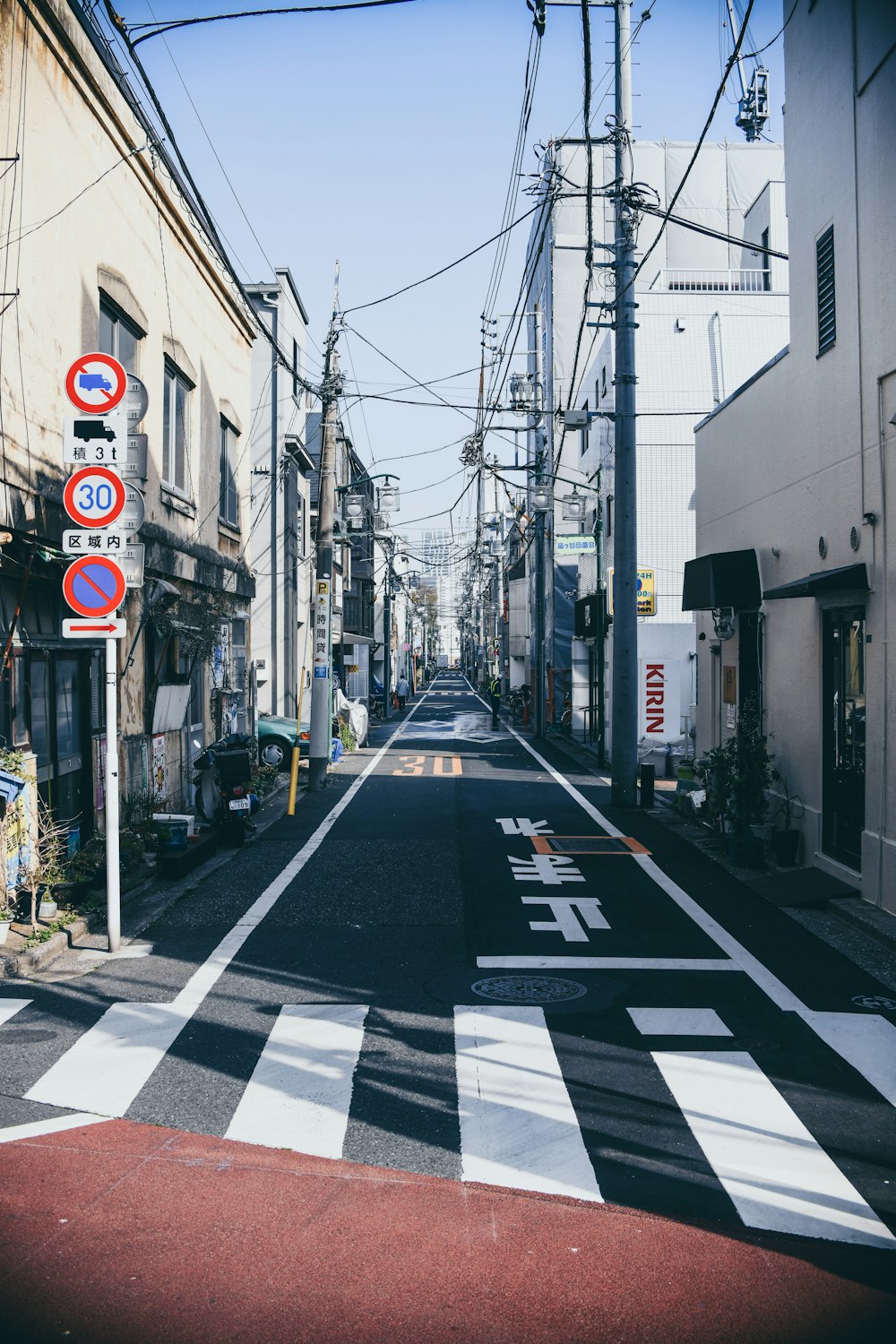 concrete road surrounded by buildings