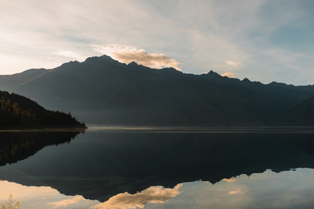 mountain across body of water