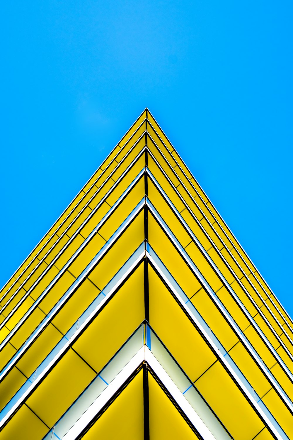 triangular yellow, white, and black artwork