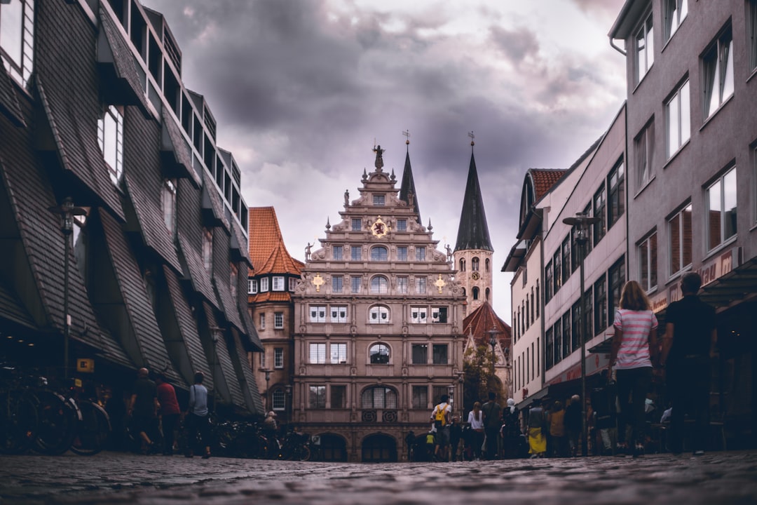 people walking near buildings during daytime