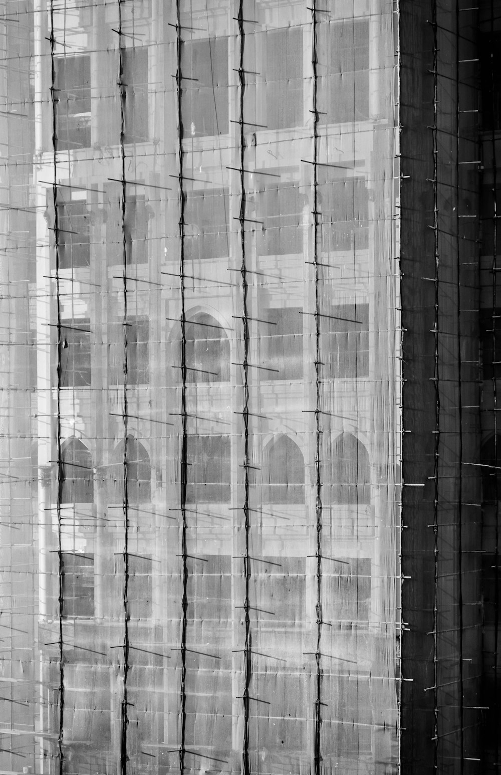 grayscale photography of high-rise building