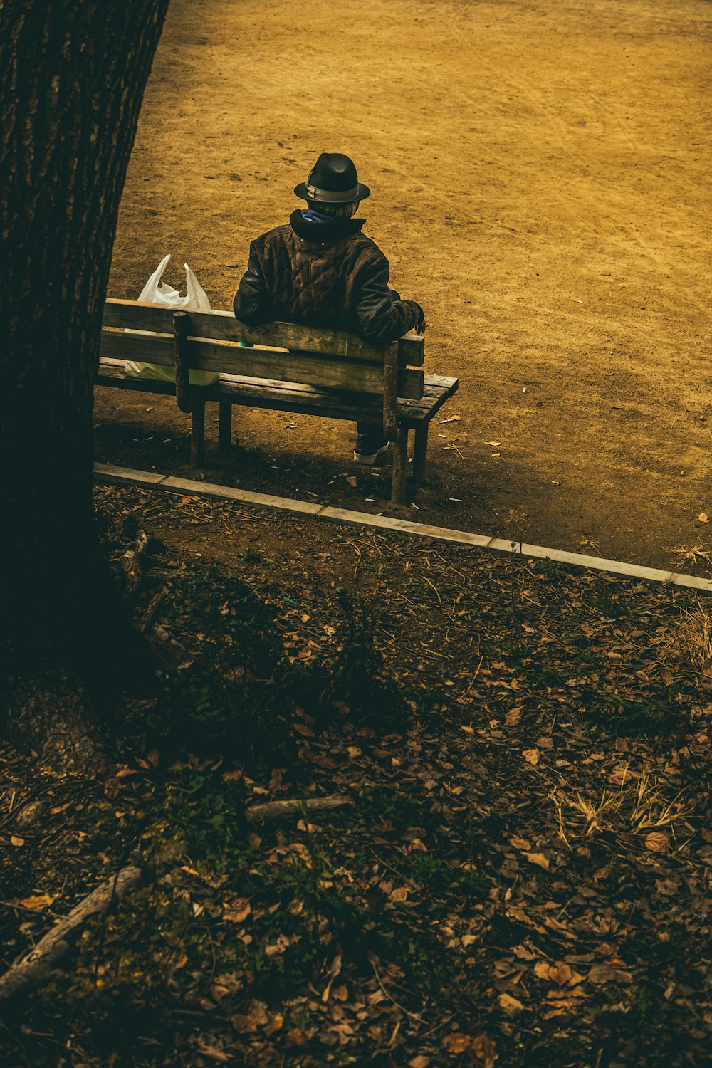 person sitting on bench