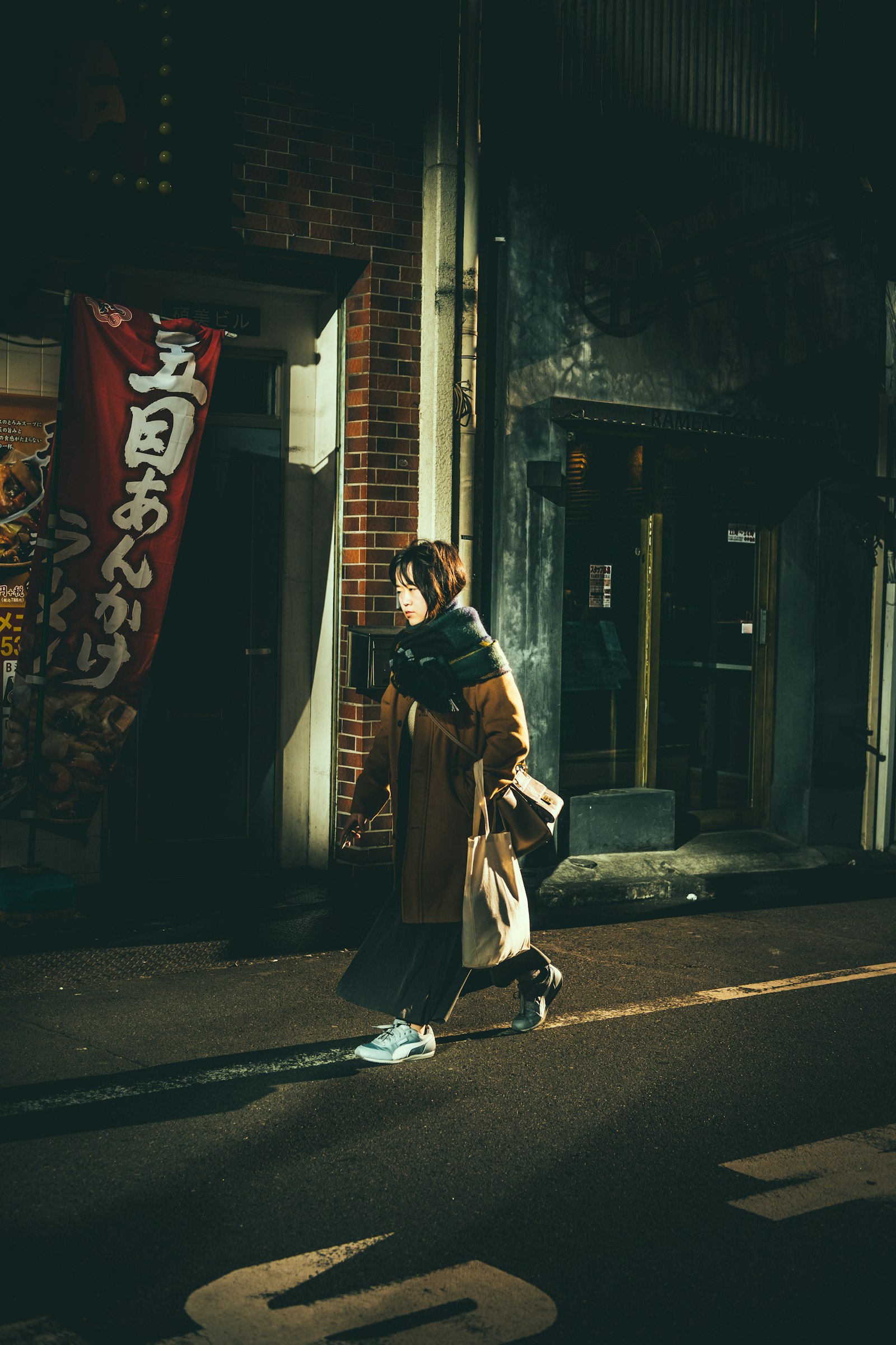 Fujifilm X-Pro2 + Fujifilm XF 35mm F2 R WR sample photo. Person walking beside building photography