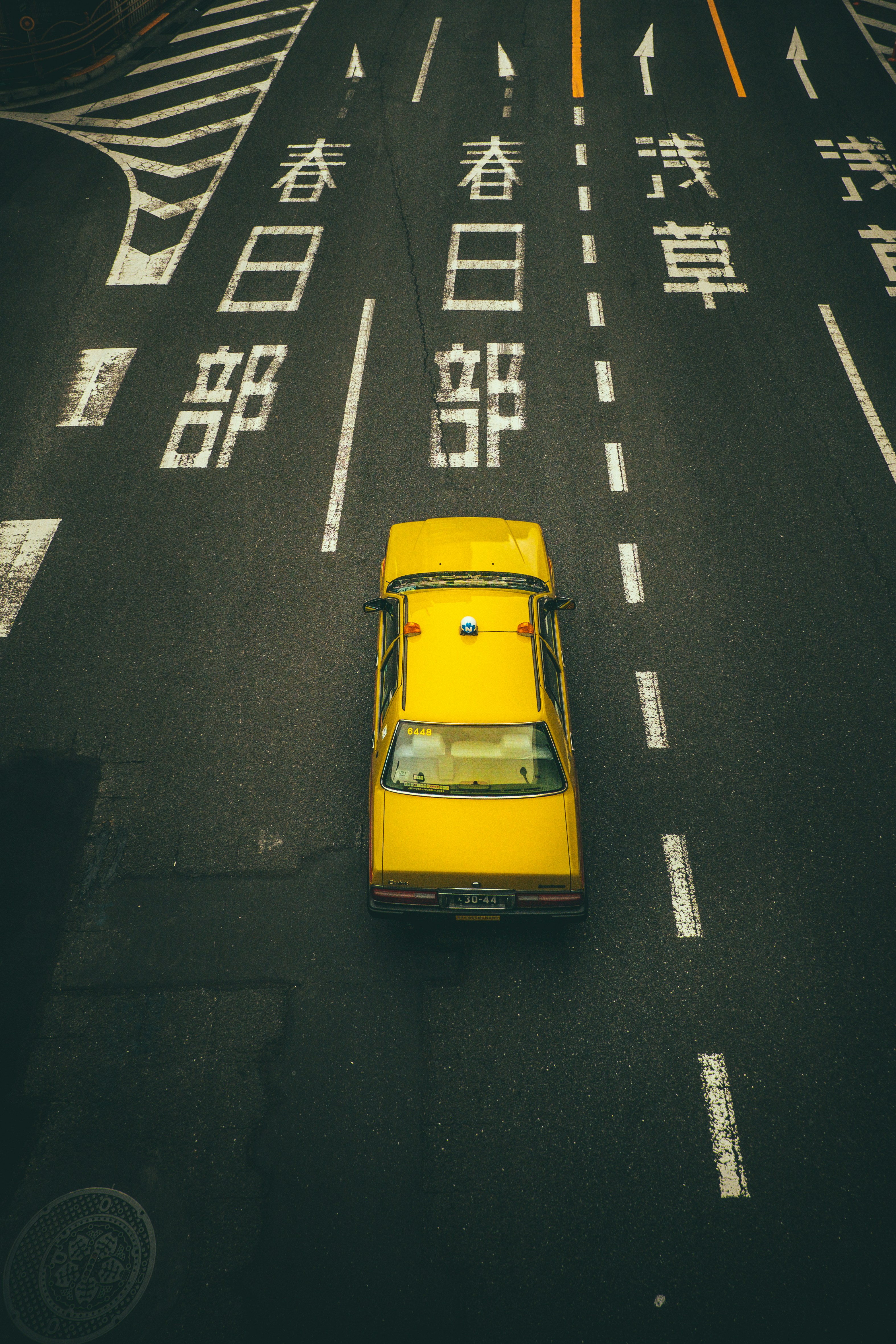Fujifilm XF 18mm F2 R sample photo. Yellow vehicle on road photography