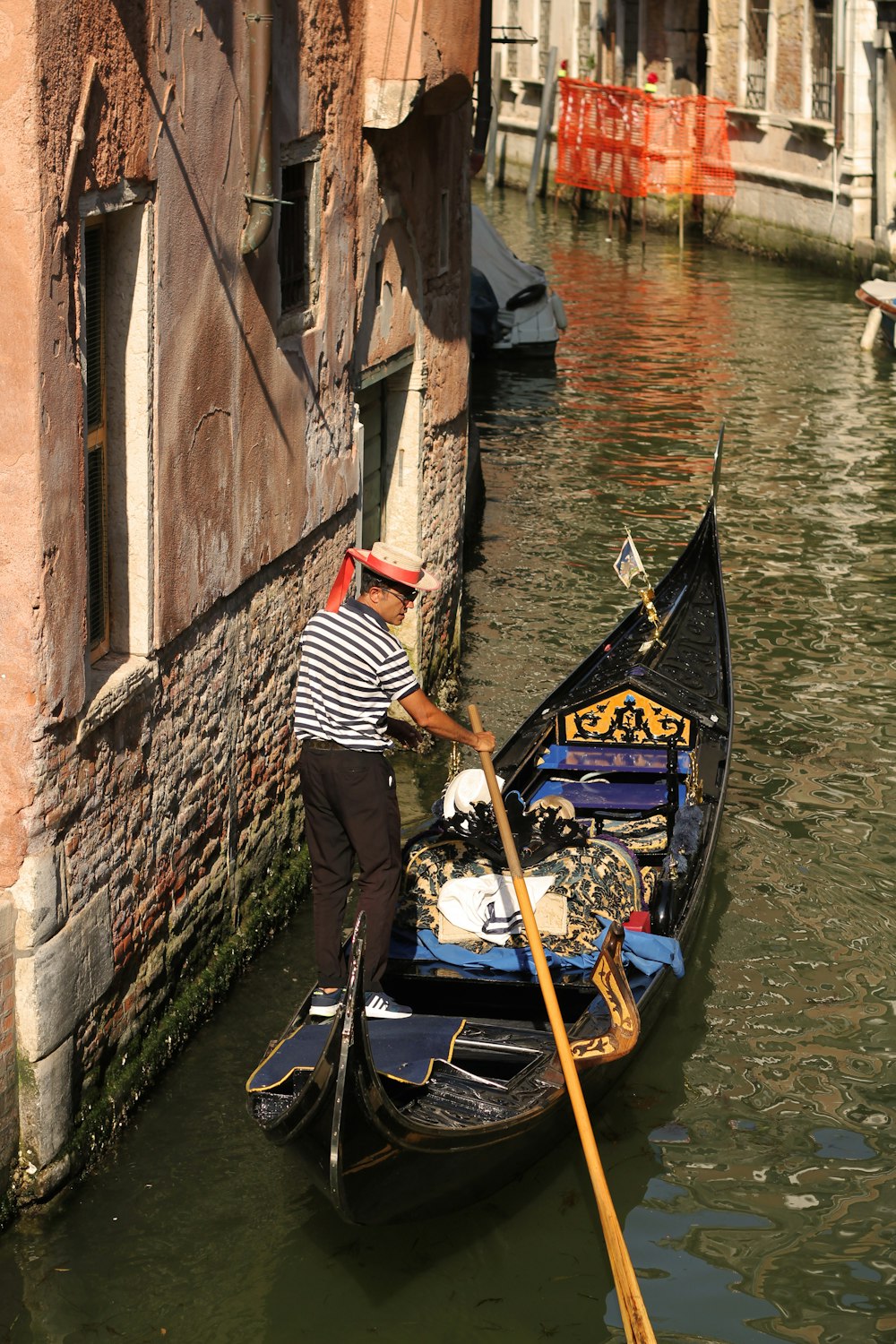 man riding on canoe