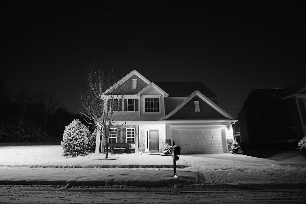 lighted white and grey house