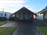 A traditional Maori carving on a wooden meeting house in New Zealand.